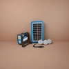 Blue-framed solar panel, black portable lamp with three LED bulbs and charging cable Application Scenario
